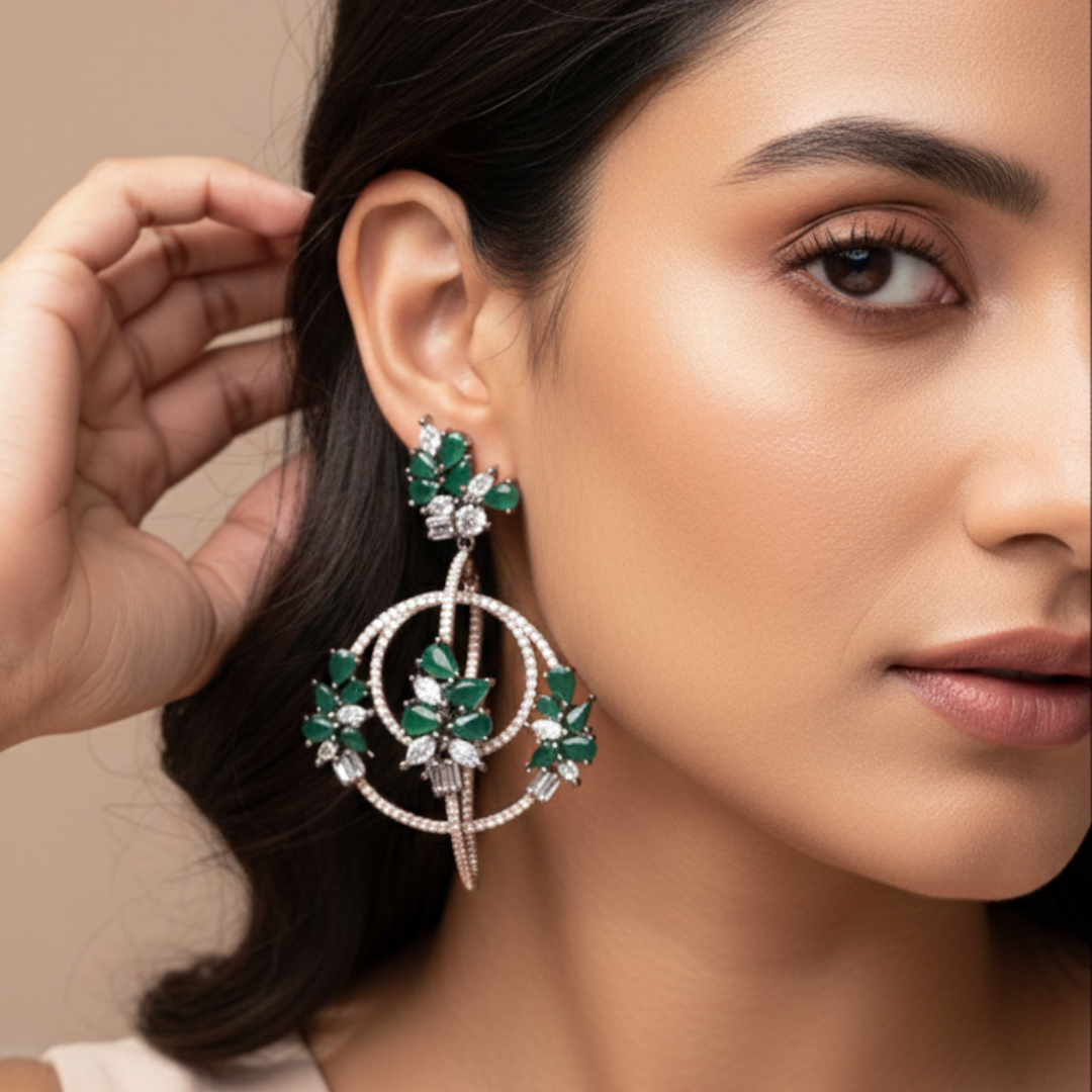 Model wearing emerald green zircon floral drop earrings with circular diamond-finish detailing